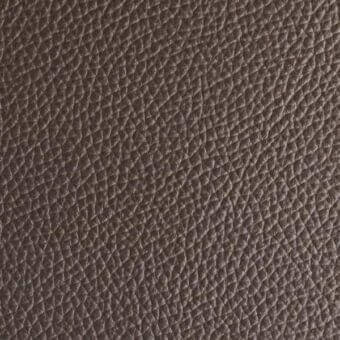 Dark brown pebbled leather texture with a fine-grained, uniformly bumpy surface and matte finish; Arketipo “pelle first” sample.